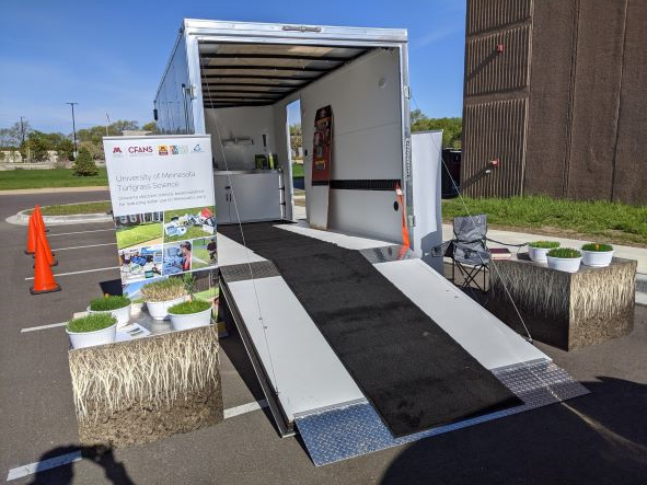 A trailer with turfgrass educational displays