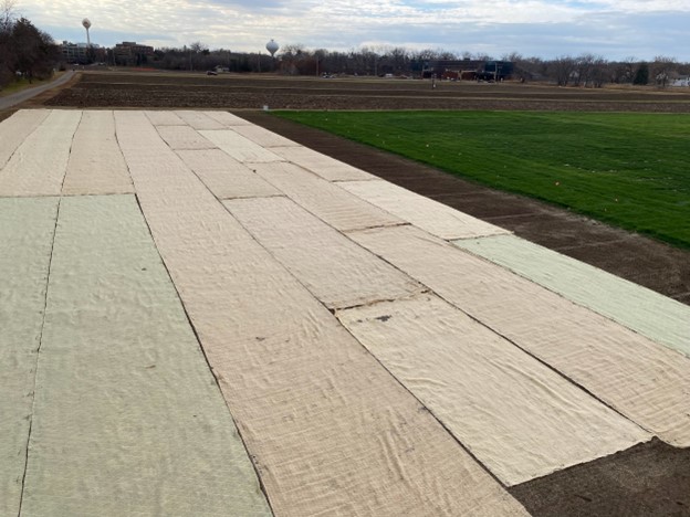 Turfgrass research plots with seeding blankets