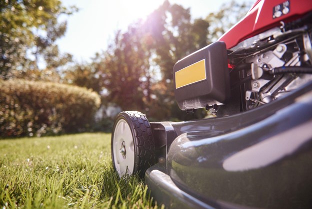 a lawn mower in a yard