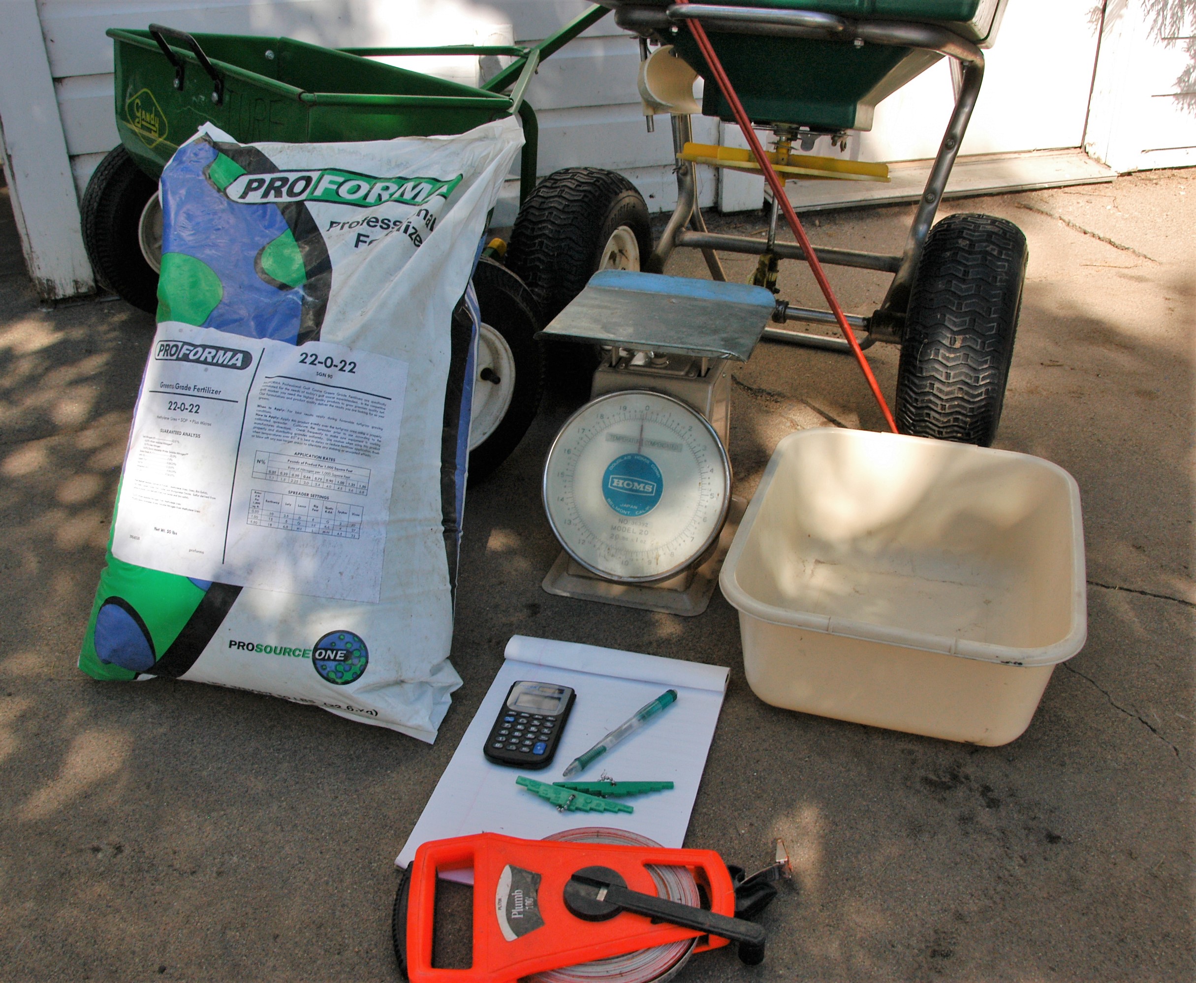 lawn care fertilizer and spreader and other lawn care equipment