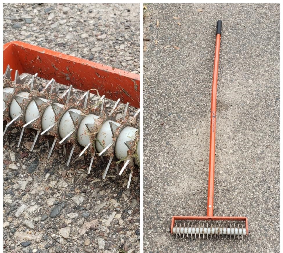 a piece of lawn care equipment with an orange handle and spikes