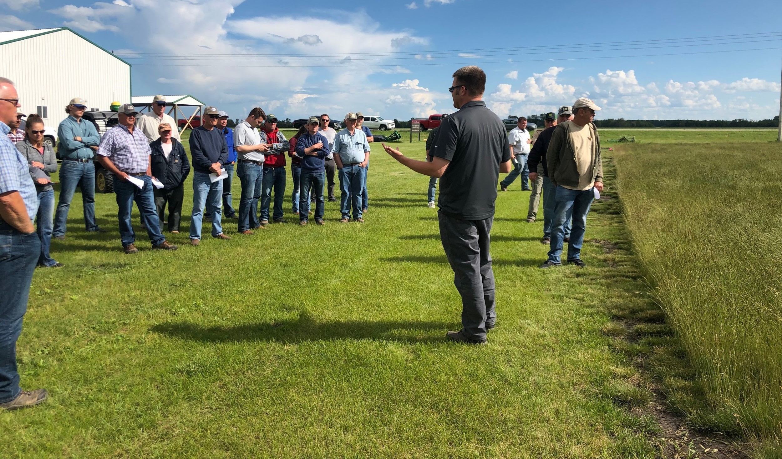 Dr. Eric Watkins discussing hard fescue with field day participants